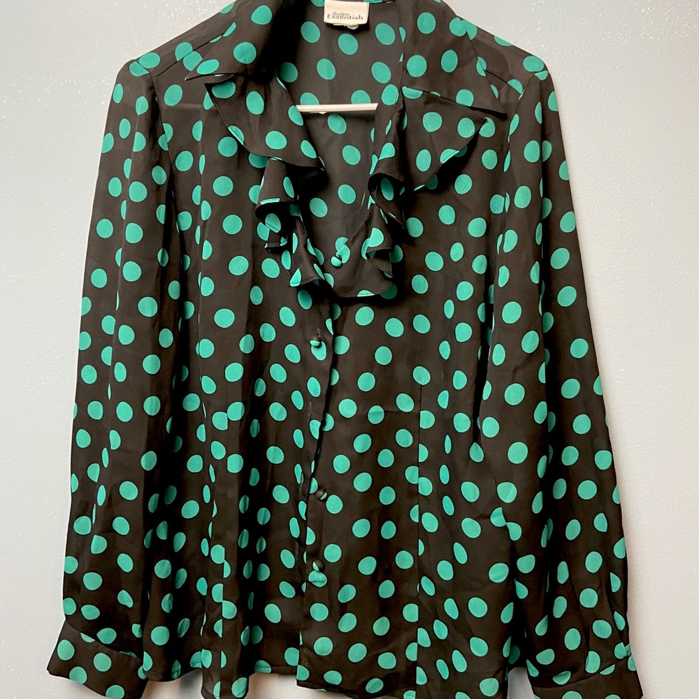 Button up blouse with ruffles along the collar